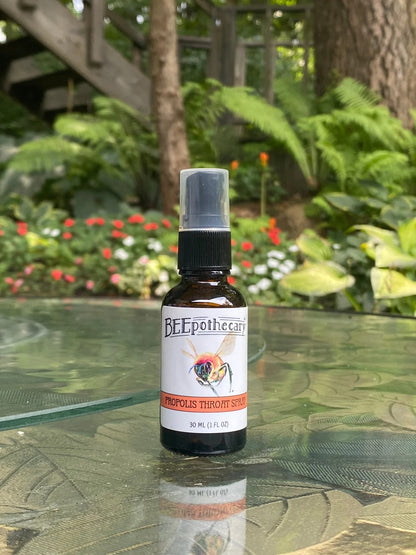 BEEpothecary Propolis Throat Spray in 30 ml brown spray bottle with white label.