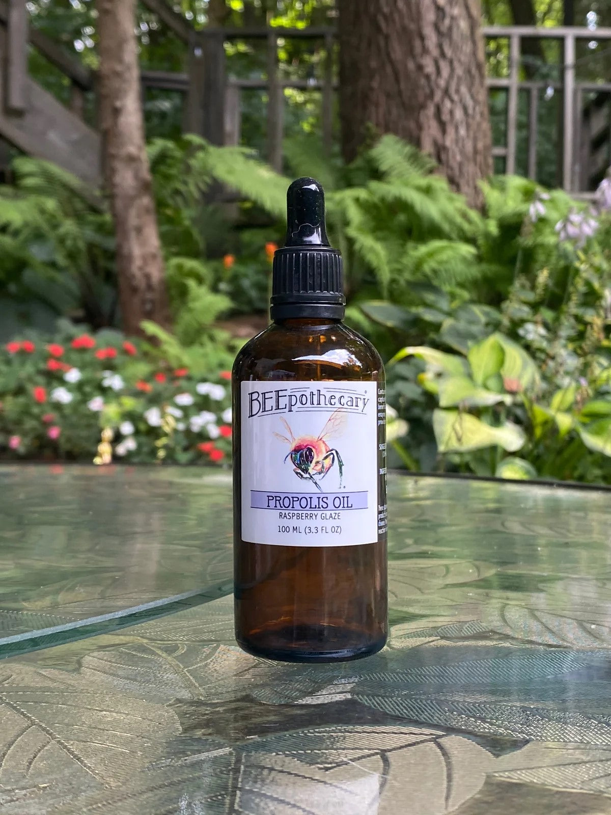 BEEpothecary Propolis Oil Raspberry Glaze in 100 ml brown bottle with white label and dropper