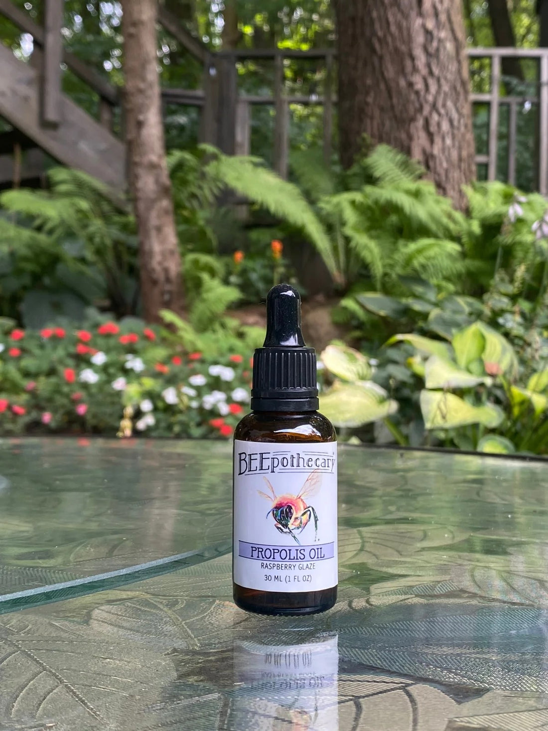 BEEpothecary Propolis Oil Raspberry Glaze in 30 ml brown bottle with white label and dropper