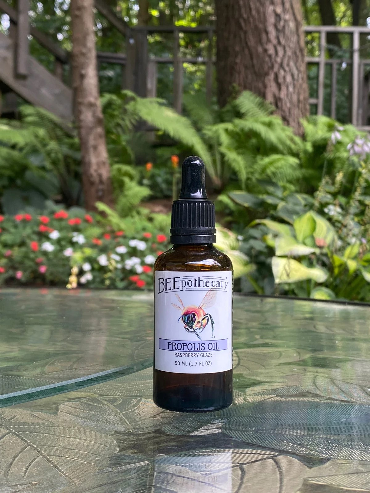 BEEpothecary Propolis Oil Raspberry Glaze in 50 ml brown bottle with white label and dropper