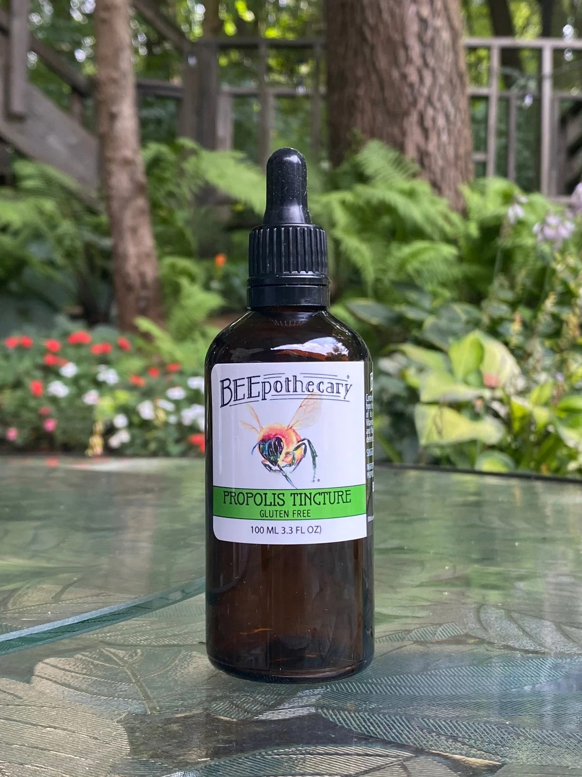 BEEpothecary Propolis Tincture Gluten Free in 100 ml brown bottle with white label and dropper.