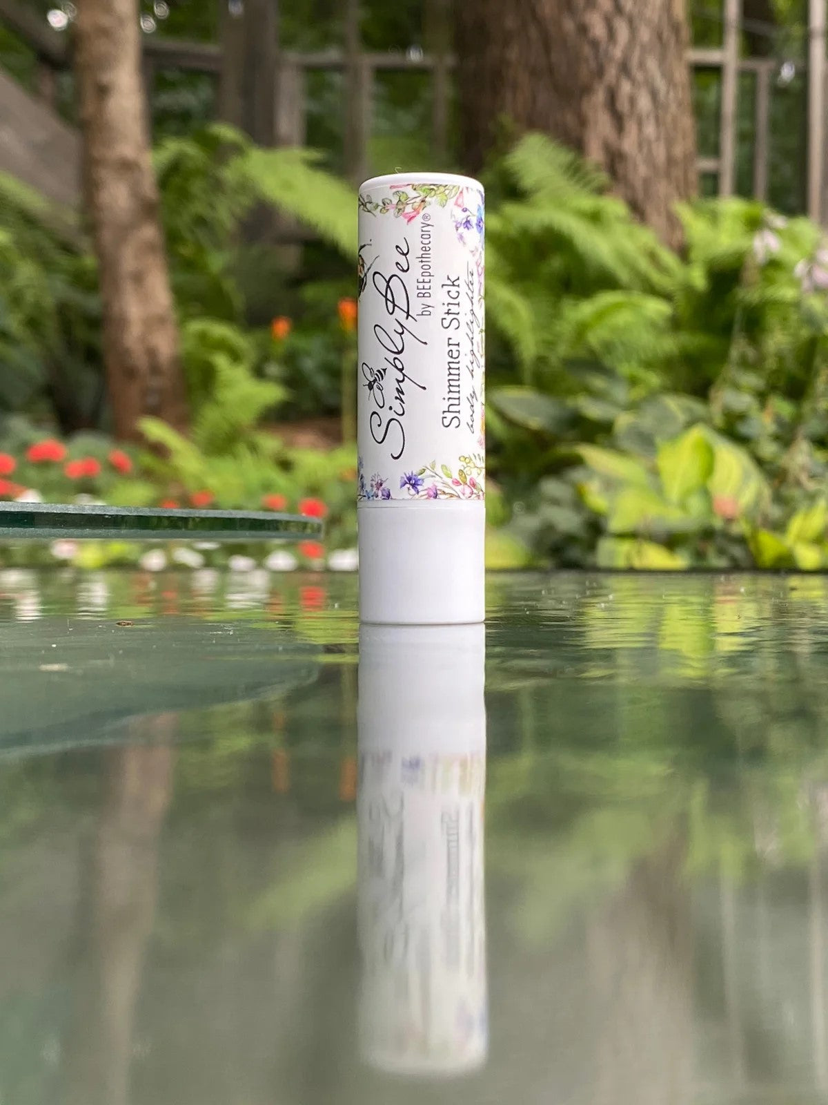 BEEpothecary Shimmer Stick on table outdoors