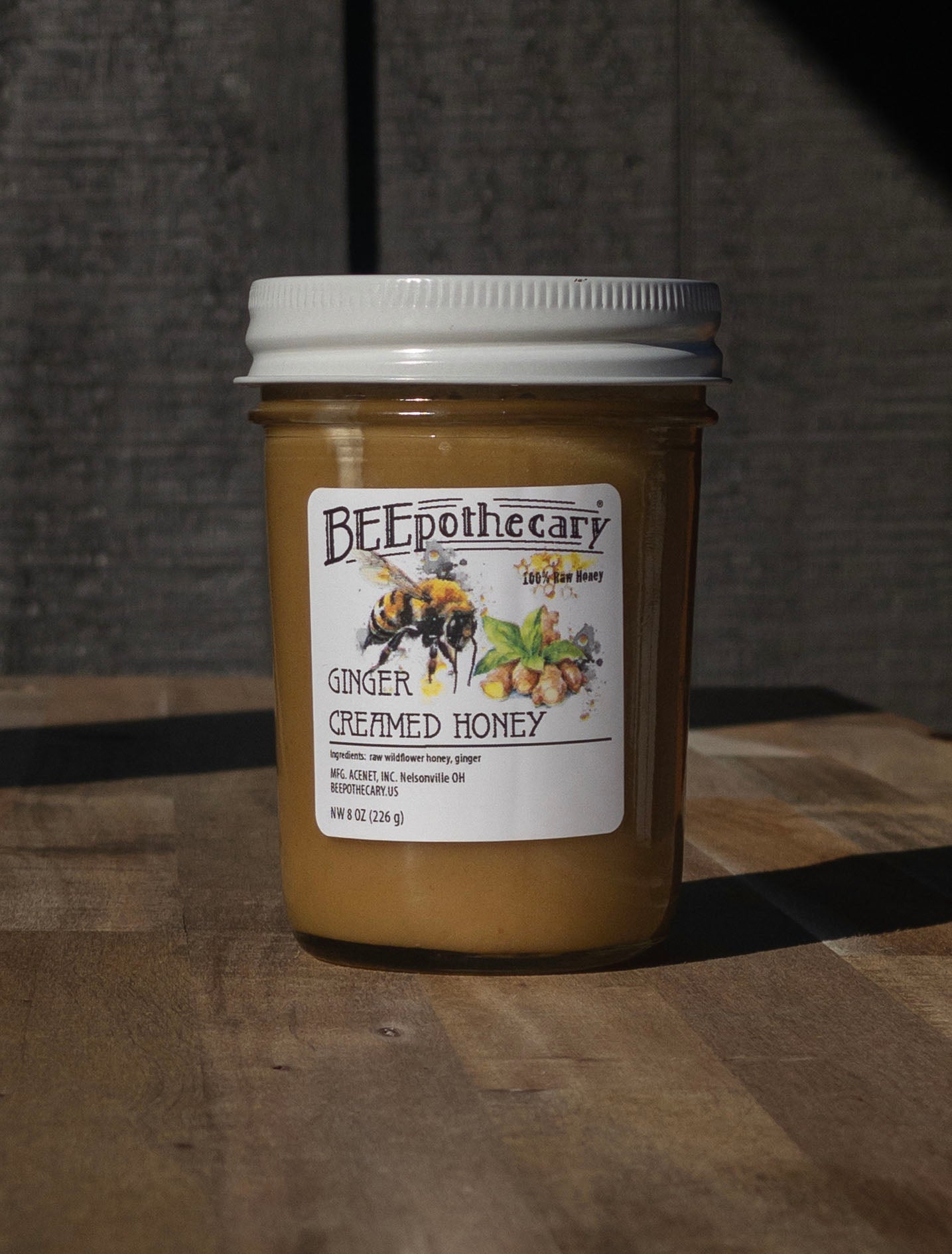 Ginger Creamed Honey in an 8oz jar with a twist off lid.